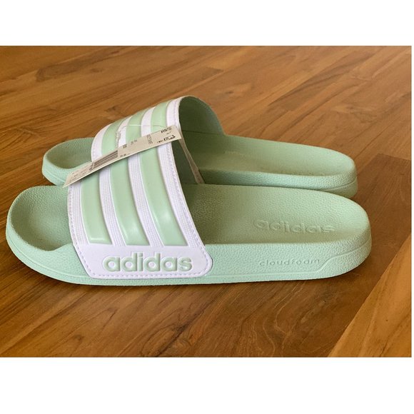 mint green adidas slides